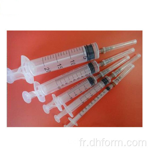 Pièces de moulage par injection plastique pour seringues